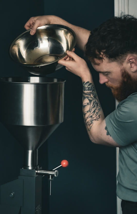 man making beard oil