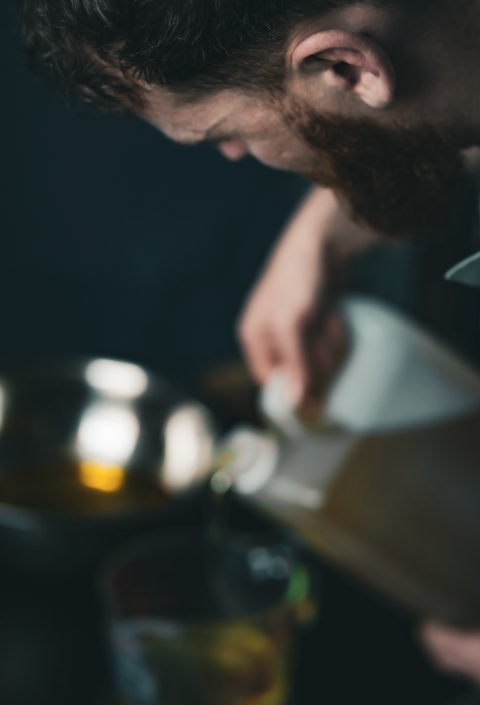 beard oil pouring