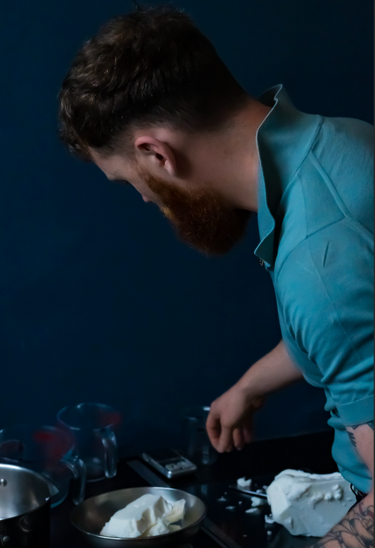 man making beard butter